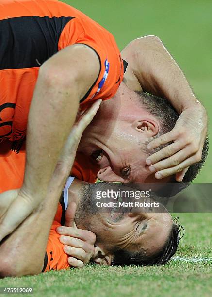 Liam Miller of the Roar celebrates a goal with Besart Berisha during the round 21 A-League match between Brisbane Roar and Perth Glory at Suncorp...