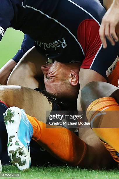 Jason Woodward of the Rebels burrows in head first into a pack during the round three Super Rugby match between the Melbourne Rebels and the Cheetahs...