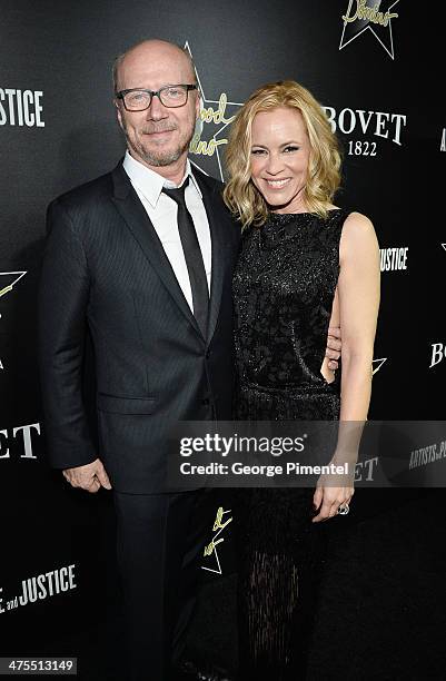 Director Paul Haggis and Actress Maria Bello attend the 7th Annual Hollywood Domino and Bovet 1822 Gala benefiting artists for peace and justice at...