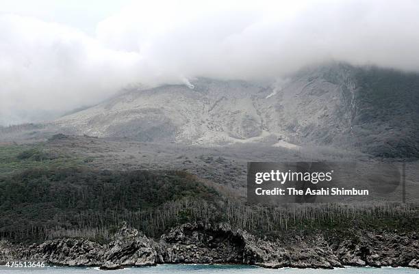 In this aerial image, Mount Shindake of Kuchinoerabu Island is seen on May 30, 2015 in Yakushima, Japan. All residents of Kuchinoerabu island were...