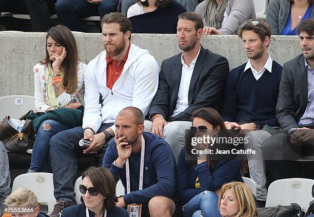 William Accambray with his girlfriend DJ Maeva Carter , Alain Bernard and Romain Grosjean attend day 5 of the French Open 2015 at Roland Garros...