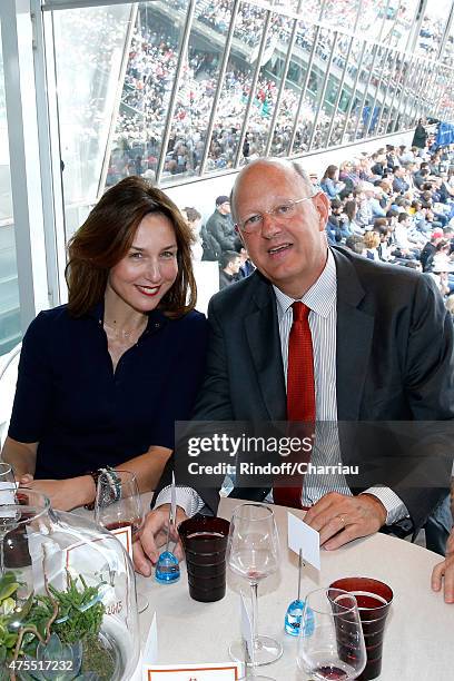 Actress Elsa Zylberstein and President of France Television Remy Pflimlin attend the 2015 Roland Garros French Tennis Open - Day Nine on June 1, 2015...