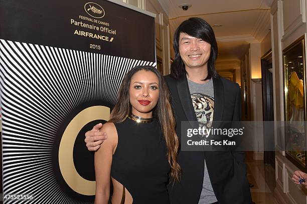 Actress Kat Graham and PR Axel Huyhn attend the Elizabeth Arden 8 Hour Party at 'C' at Carlton - The 68th Annual Cannes Film Festival l on May 23,...