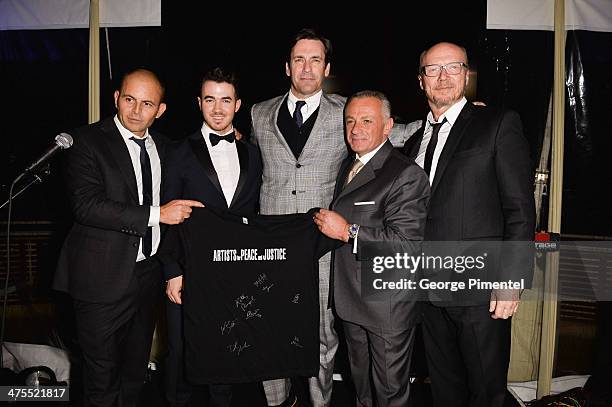 David Belle, musician Kevin Jonas, actor Jon Hamm, President of Bovet 1822 Pascal Raffy, and writer/producer Paul Haggis attend the 7th Annual...