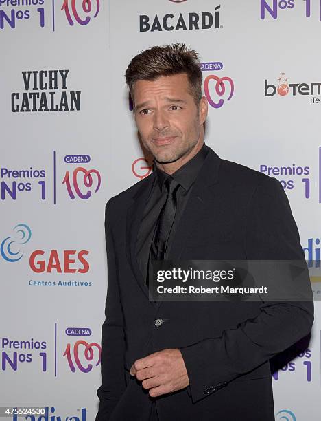 Ricky Martin attends a photocall for the 'Numeros 1 de la Cadena 100' awards held at the Museu Nacional d'Art de Catalunya on May 28, 2015 in...