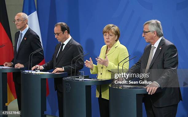 German Chancellor Angela Merkel, French President Francois Hollande , European Round Table of Industrialists Chairman Benoit Potier and European...