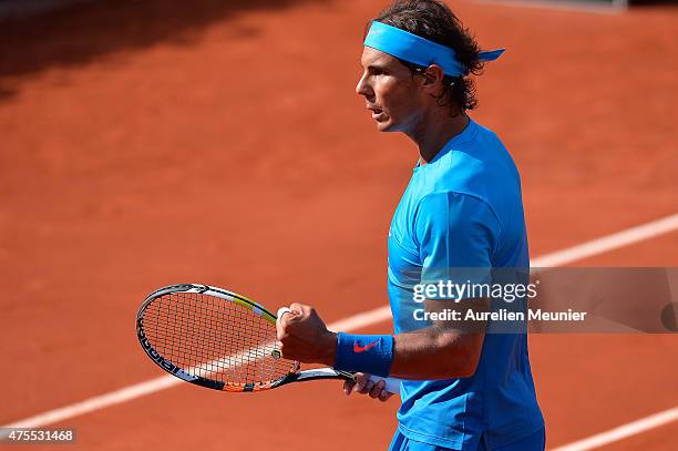 Rafael Nadal of Spain reacts during his men's singles fourth round match against Jack Sock of the United States of America on day eight of the French...