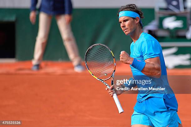 Rafael Nadal of Spain reacts during his men's singles fourth round match against Jack Sock of the United States of America on day eight of the French...