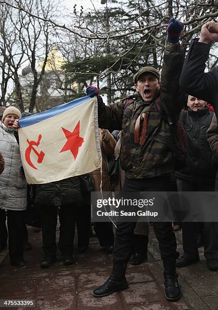 Pro-Russian supporters rally outside the Crimean parliament building on February 28, 2014 in Simferopol, Ukraine. According to media reports Russian...
