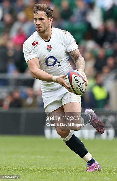 Danny Cipriani of England runs with the ball during the Rugby Union International match between England and the Barbarians at Twickenham Stadium on...
