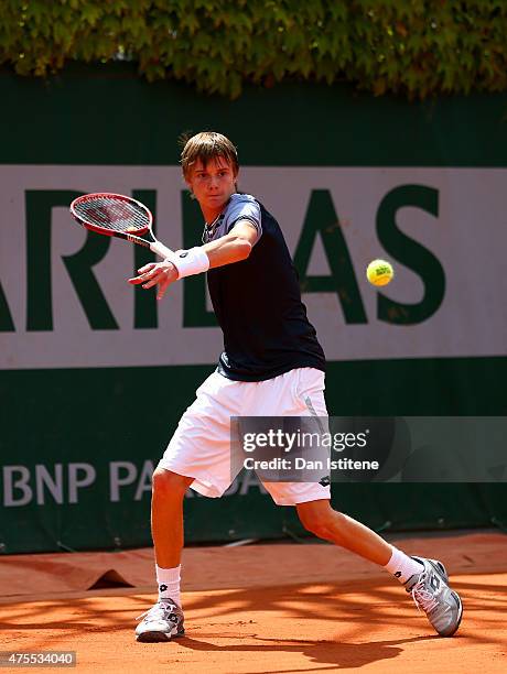 Alexander Bublik of Russia in action during his boys singles match against William Blumberg of the United States on day nine of the 2015 French Open...