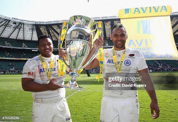 Billy Vunipola and his brother Mako Vunipola of Saracens celebrate after their victory during the Aviva Premiership Final between Bath and Saracens...