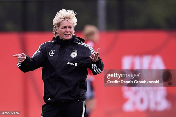 Head coach Silvia Neid of Germany looks on during a training session at Richcraft Recreation Center on June 1, 2015 in Ottawa, Canada.