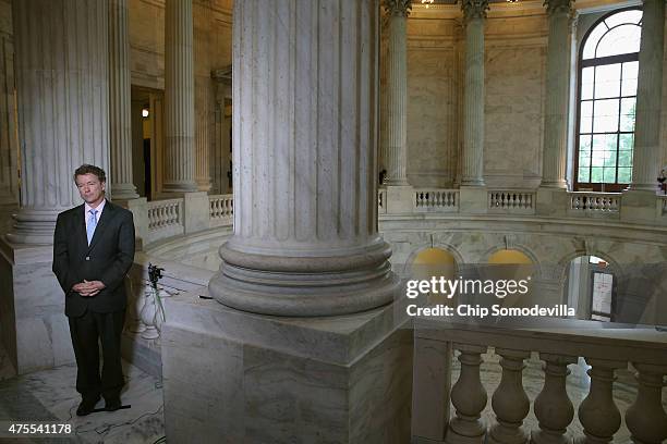 Sen. Rand Paul does a live interview with FOX News in the Russell Senate Office Building rotunda on Capitol Hill June 1, 2015 in Washington, DC. In...