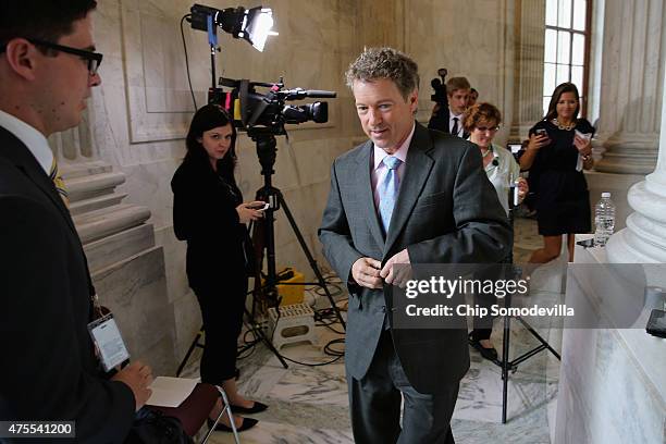 Sen. Rand Paul finishes an interview with ABC News in the Russell Senate Office Building rotunda on Capitol Hill June 1, 2015 in Washington, DC. In...