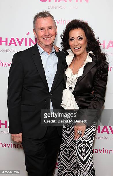 Nigel Evans and Nancy Dell'Olio attend The Chavin Jewellery Trunk Show Barbecue at Imperial Wharf on June 1, 2015 in London, England.