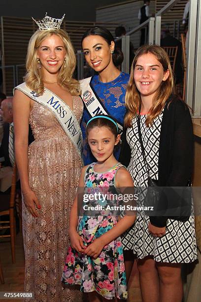Jillian Tapper and Iman Oubou with guests at the Childrens Health Fund Annual Gala at Jazz at Lincoln Center on June 1, 2015 in New York City.