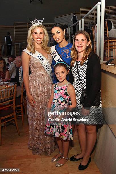 Jillian Tapper and Iman Oubou with guests at the Childrens Health Fund Annual Gala at Jazz at Lincoln Center on June 1, 2015 in New York City.