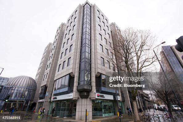 Societe Generale SA's offices, center, stand next to the entrance to ...