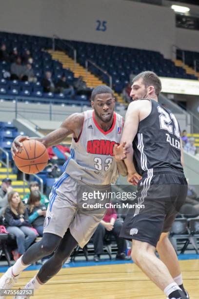 Willie Reed of the Springfield Armor moves the ball with contact from Luke Zeller of the Austin Toros during a game at the MassMutual Center on...