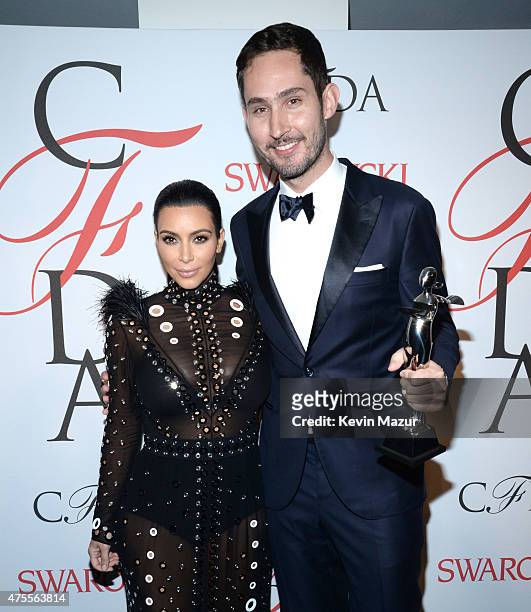 Kim Kardashian West and Kevin Systrom pose backstage at the 2015 CFDA Fashion Awards at Alice Tully Hall at Lincoln Center on June 1, 2015 in New...