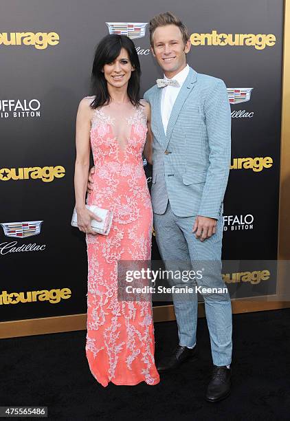 Actress Perrey Reeves and artist Bryan Fox attend the premiere of ENTOURAGE, sponsored by Buffalo David Bitton, at the Regency Village Theatre on...