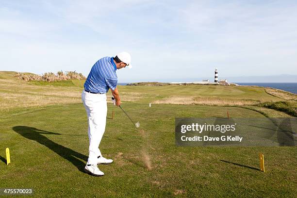 golfer driving off tee box - tee box stock pictures, royalty-free photos & images
