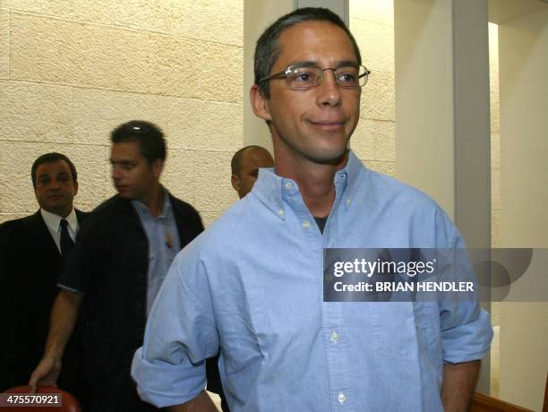 Gilad Sharon, son of Israeli Prime Minister Ariel Sharon, arrives in Israel's Supreme Court 29 September 2003, in Jerusalem for a state prosecutor...