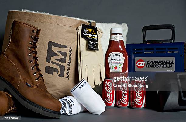 Products made by companies owned or invested in by Berkshire Hathaway Inc., including, from left, Justin Boots, Johns Manville, Fruit of the Loom,...