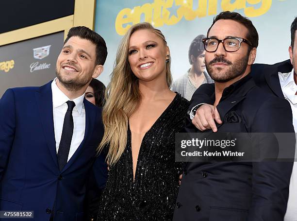 Actors Jerry Ferrara, Ronda Rousey and Jeremy Piven attend the premiere of Warner Bros. Pictures' "Entourage" at Regency Village Theatre on June 1,...