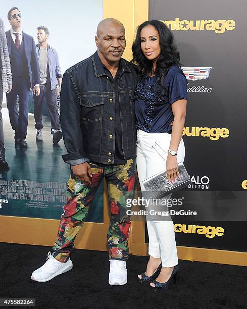 Boxer Mike Tyson and Kiki Tyson arrive at the Los Angeles premiere of "Entourage" at Regency Village Theatre on June 1, 2015 in Westwood, California.