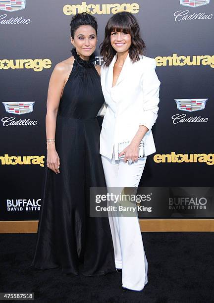 Actresses Emmanuelle Chriqui and Carla Gugino arrive at Warner Bros. Pictures Premiere of 'Entourage' at Regency Village Theatre on June 1, 2015 in...