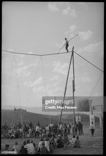 National rope-walker, darvaz, on high rope, dor, installed in hilly area, 1940-s, Uzbekistan, circa 1940.