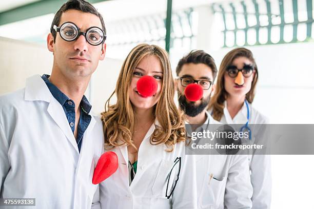 funny doctors at the hospital - clown's nose stock pictures, royalty-free photos & images