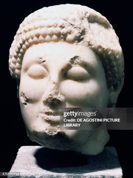 Marble head of a Kouros. Etruscan civilisation, 6th century BC. Marzabotto, Museo Nazionale Etrusco Pompeo Aria