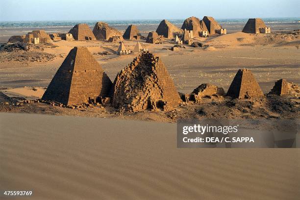 Funeral pyramids and temples from the Kingdom of Kush , necropolis on the Island of Meroe , Sudan. Meroitic civilisation.