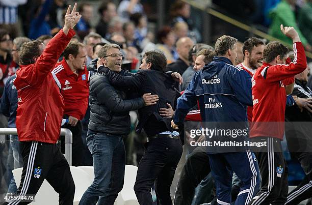 Head coach Bruno Labbadia of Hamburg celebrates with Peter Knaebel, director of professional football of Hamburg, after the second leg of the...