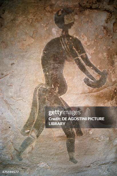 Black lady, rock art, Sefar site, Tassili n'Ajjer , Algeria. Neolithic.