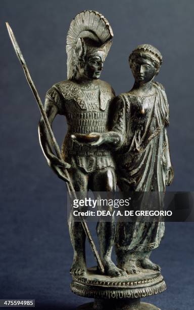 Small bronze group depicting a warrior departing for war, and his wife offering him a libation phiale, from Marzabotto . Etruscan civilisation, 4th...
