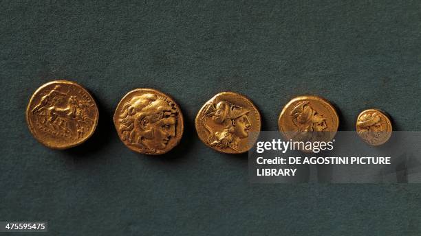 Coins, gold, found in Taranto, Puglia, Italy. Greek civilisation. Taranto, Museo Archeologico Nazionale