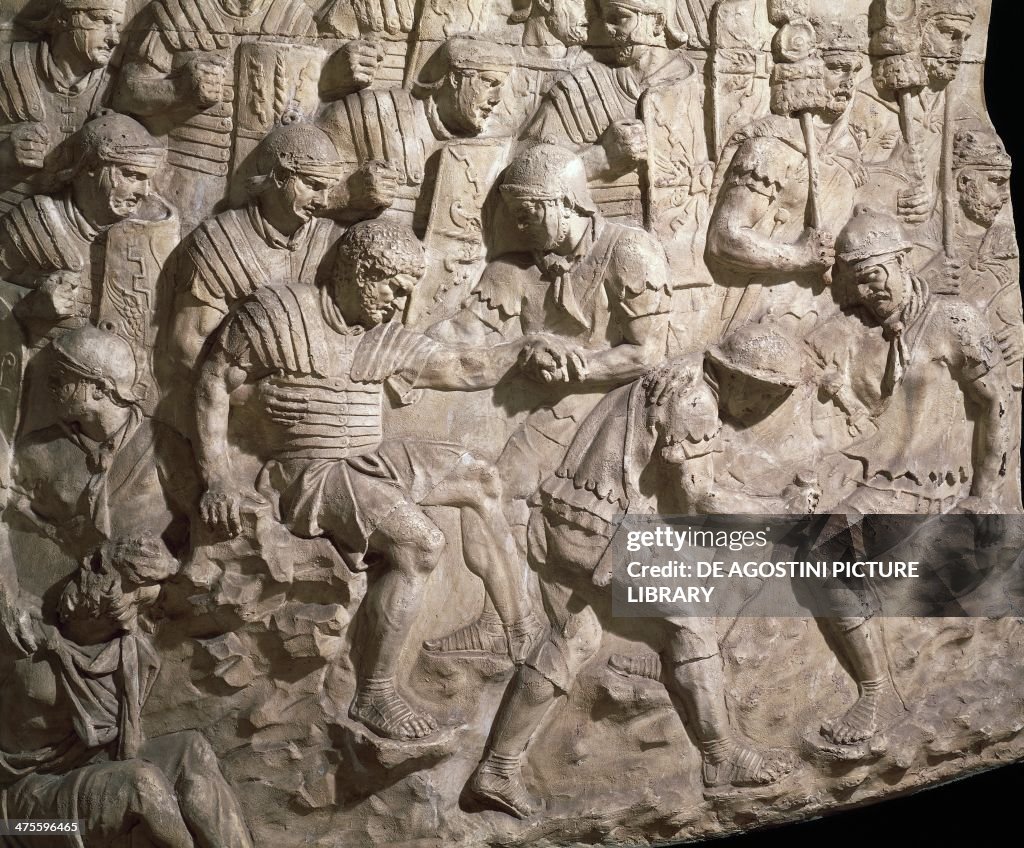 Soldiers aiding their wounded comrades...