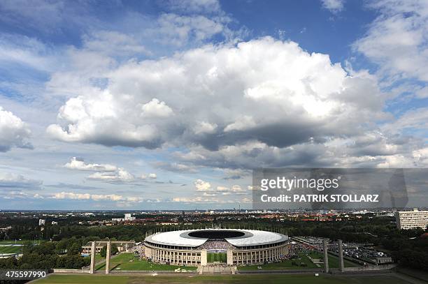 General exterior view of Berlin's Olympic stadium taken as supporters arrive to attend the friendly football match Hertha Berlin vs Real Madrid on...