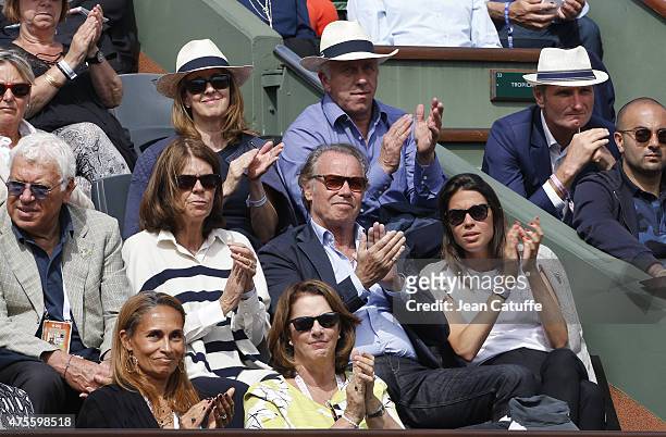 Beatrice Leeb, Michel Leeb, their daughter Elsa Leeb, above them Greg LeMond and his wife Kathy LeMond attend day 9 of the French Open 2015 at Roland...