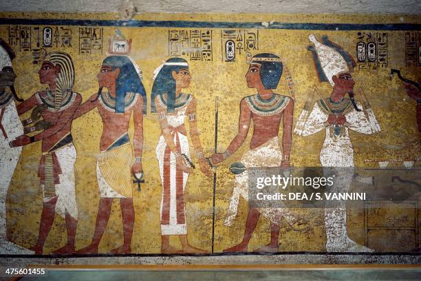 Tutankhamun with his ka before Osiris, the young pharaoh in front of the goddess Nut and Ay performing the opening of the mouth ceremony, fresco,...