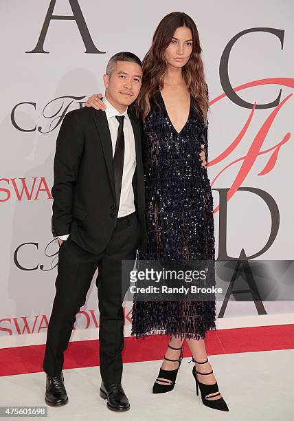 Designer Thakoon Panichgul and model Lily Aldridge attend the 2015 CFDA Fashion Awards at Alice Tully Hall at Lincoln Center on June 1, 2015 in New...