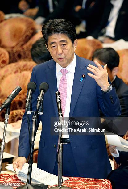 Prime Minister Shinzo Abe responds to questions during the special committee on security legislation bills at the lower house on June 1, 2015 in...