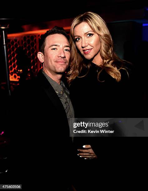 Actor David Faustino and his guest pose at the after party for the premiere of Warner Bros. Pictures' "Entourage" on June 1, 2015 in Los Angeles,...