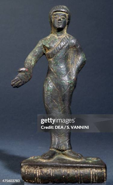 Offerings bearer, Etruscan bronze statuette. Etruscan civilisation, 5th century BC.