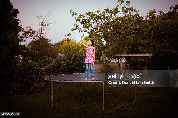 in search of a signal - trampoline stock pictures, royalty-free photos & images