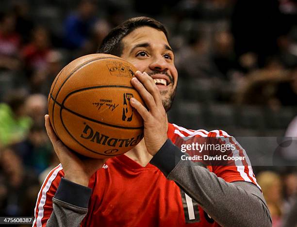 Toronto Raptors point guard Greivis Vasquez looks at the hoop during the warm up before the game between the Toronto Raptors and the Washington...